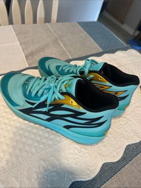 Puma M.E.L.O. Teal and Black Basketball Sneakers with Gold Carmelo Anthony